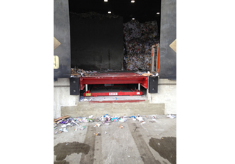 Bespoke dock leveller keeps waste paper bails flowing smoothly to Chinese recyclers